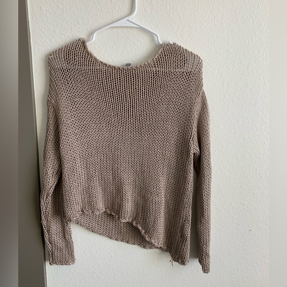 Asymmetrical cable knit sweater